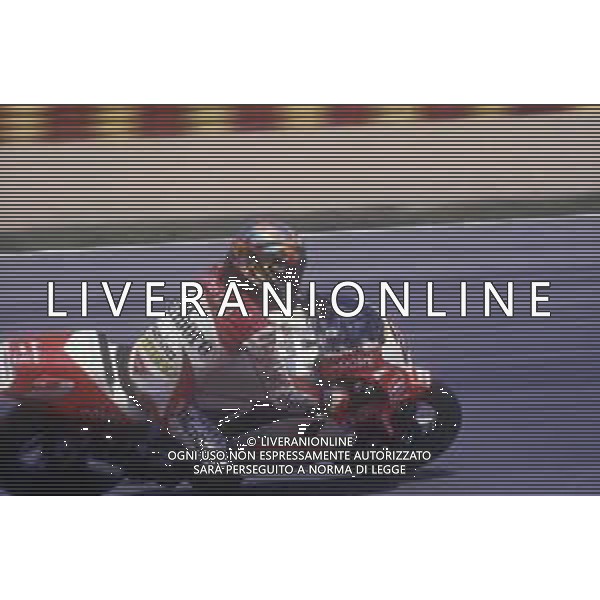 RETROSPETTIVA LORIS CAPIROSSI PILOTA MOTO NELLA FOTO LORIS CAPIROSSI NELL\'ANNO 1994 AG CONTROLUCE-AG ALDO LIVERANI SAS 