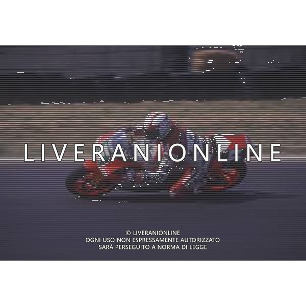DIAP-RETROSPETTIVA LUCA CADALORA PILOTA MOTO NELLA FOTO LUCA CADALORA NELL\'ANNO 1988 AG CONTROLUCE-AG ALDO LIVERANI SAS 