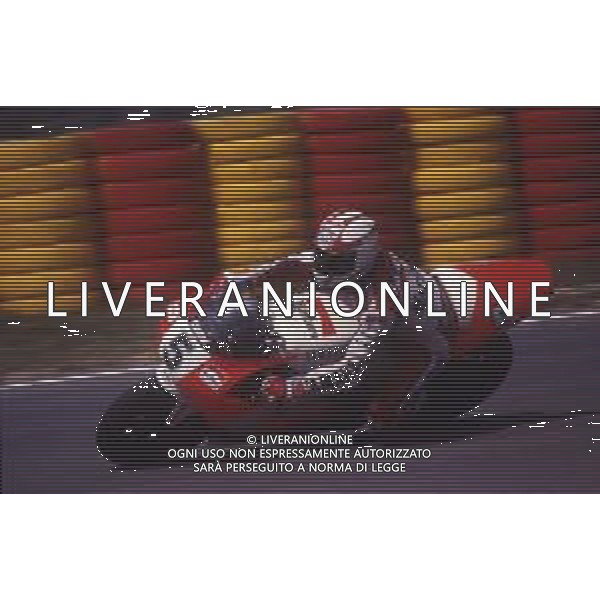 DIAP-RETROSPETTIVA LUCA CADALORA PILOTA MOTO NELLA FOTO LUCA CADALORA NELL\'ANNO 1990 AG CONTROLUCE-AG ALDO LIVERANI SAS 
