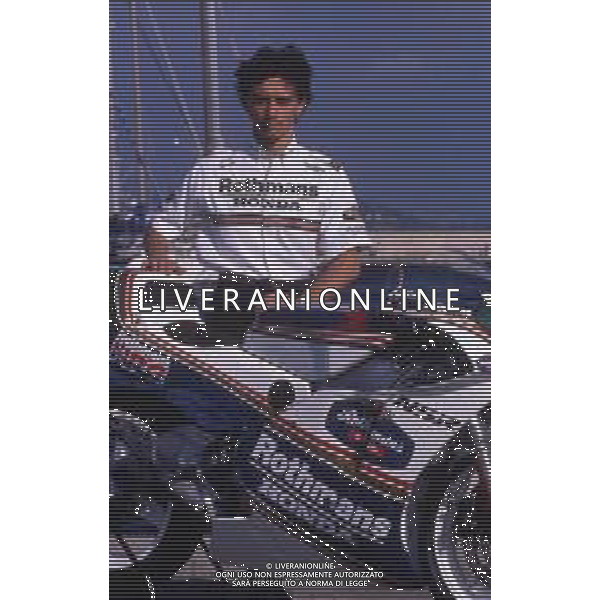 DIAP-RETROSPETTIVA LUCA CADALORA PILOTA MOTO NELLA FOTO LUCA CADALORA NELL\'ANNO 1991 AG CONTROLUCE-AG ALDO LIVERANI SAS 
