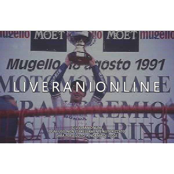 DIAP-RETROSPETTIVA LUCA CADALORA PILOTA MOTO NELLA FOTO LUCA CADALORA NELL\'ANNO 1991 AG CONTROLUCE-AG ALDO LIVERANI SAS 