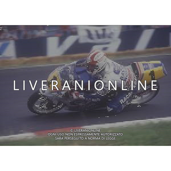 DIAP-RETROSPETTIVA LUCA CADALORA PILOTA MOTO NELLA FOTO LUCA CADALORA NELL\'ANNO 1992 AG CONTROLUCE-AG ALDO LIVERANI SAS  