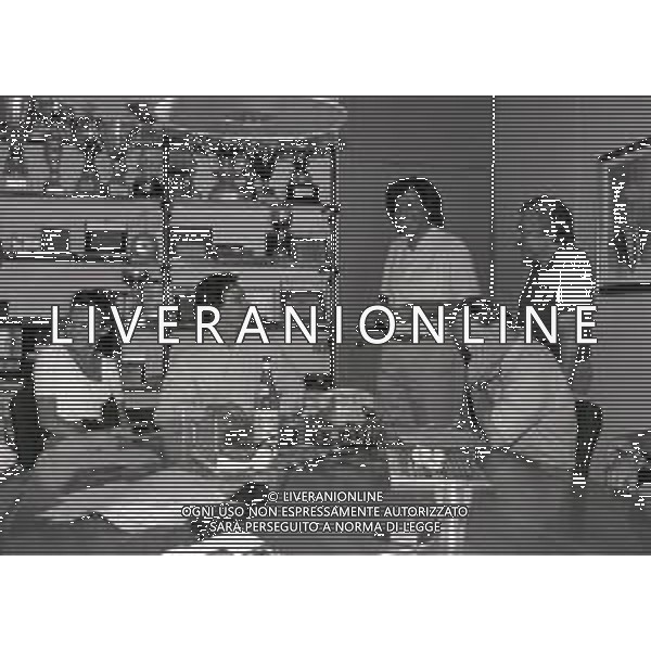 NEG-RETROSPETTIVA LUCA CADALORA PILOTA MOTO NELLA FOTO LUCA CADALORA NELL\'ANNO 1992 OSPITE DELLA REDAZIONE DELLA GAZZETTA DELLO SPORT PER LE TELEFONATE COI LETTORI AG ALDO LIVERANI SAS  