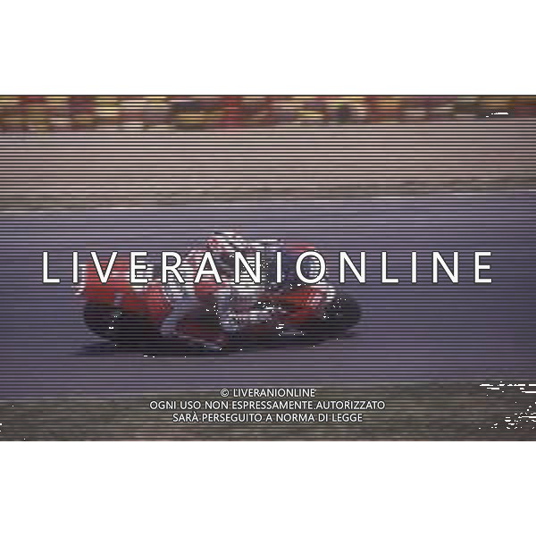 DIAP-RETROSPETTIVA LUCA CADALORA PILOTA MOTO NELLA FOTO LUCA CADALORA NELL\'ANNO 1993 AL MUGELLO AG CONTROLUCE-AG ALDO LIVERANI SAS 
