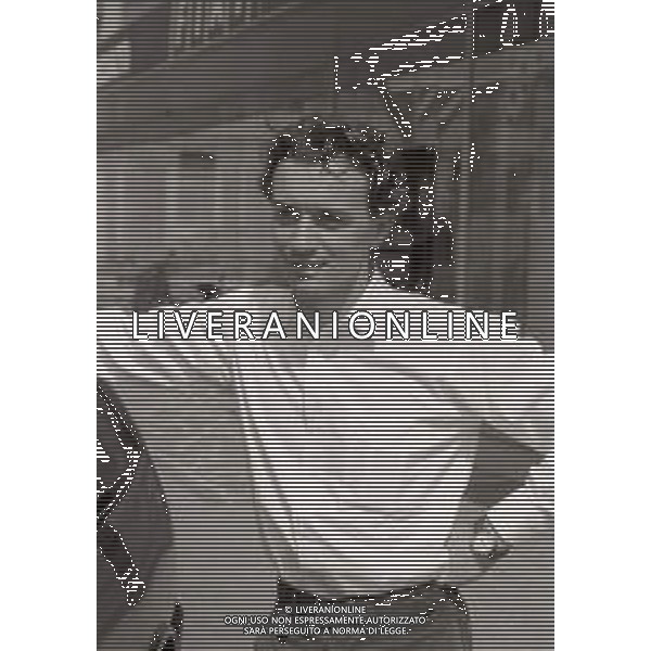 DIAP-RETROSPETTIVA LUCA CADALORA PILOTA MOTO NELLA FOTO LUCA CADALORA NELL\'ANNO 1993 A MODENA CONCESSIONARIO FIAT AG CONTROLUCE-AG ALDO LIVERANI SAS  