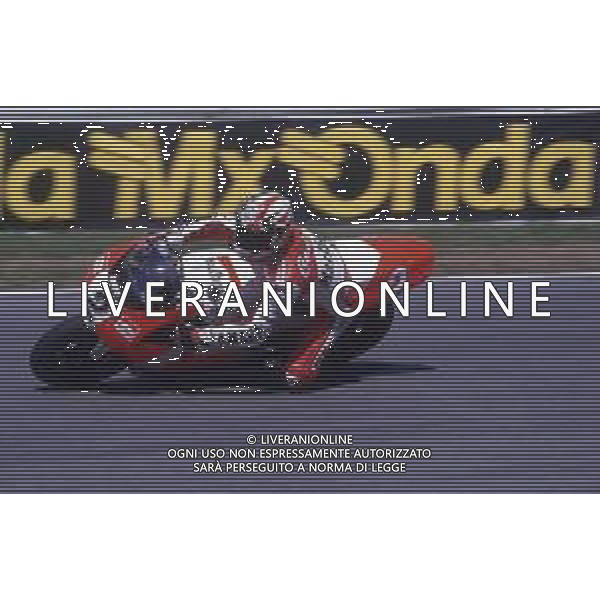 DIAP-RETROSPETTIVA LUCA CADALORA PILOTA MOTO NELLA FOTO LUCA CADALORA NELL\'ANNO 1995 AG CONTROLUCE-AG ALDO LIVERANI SAS 
