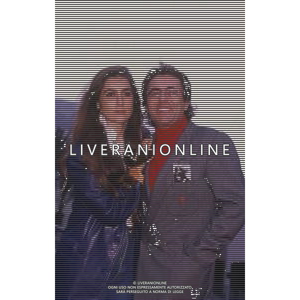 DIAP-RETROSPETTIVA ALBANO CARRISI CANTANTE NELLA FOTO ALBANO CARRISI NELL\'ANNO 1999 AL FESTIVAL DI SANREMO CON ROMINA POWER AG ALDO LIVERANI SAS  