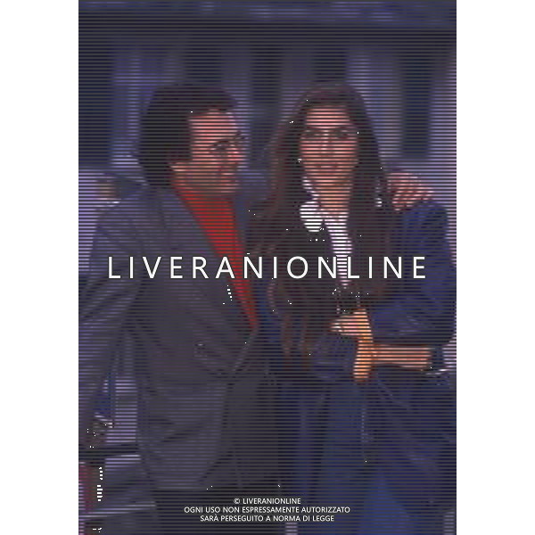 DIAP-RETROSPETTIVA ALBANO CARRISI CANTANTE NELLA FOTO ALBANO CARRISI NELL\'ANNO 1999 AL FESTIVAL DI SANREMO CON ROMINA POWER AG ALDO LIVERANI SAS  