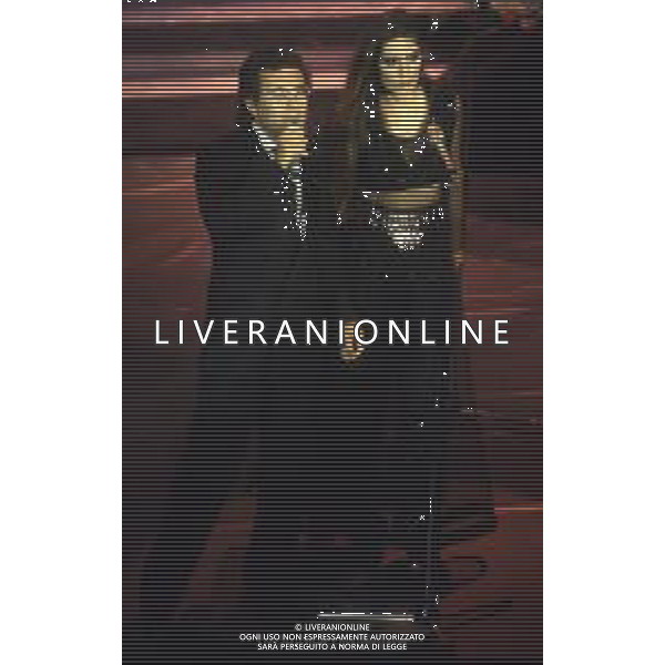 DIAP-RETROSPETTIVA ALBANO CARRISI CANTANTE NELLA FOTO ALBANO CARRISI CON ROMINA POWER AL FESTIVAL DI SANREMO NELL\'ANNO 1991 AG ALDO LIVERANI SAS