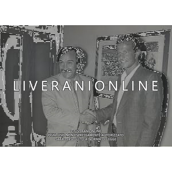 NEG-RETROSPETTIVA LUCIANO SPINOSI CALCIATORE NELLA FOTO LUCIANO SPINOSI CON SILVANO RAMACCIONI NELLA SEDE DEL MILAN NELL\'ANNO 1983-1984 AG ALDO LIVERANI SAS  
