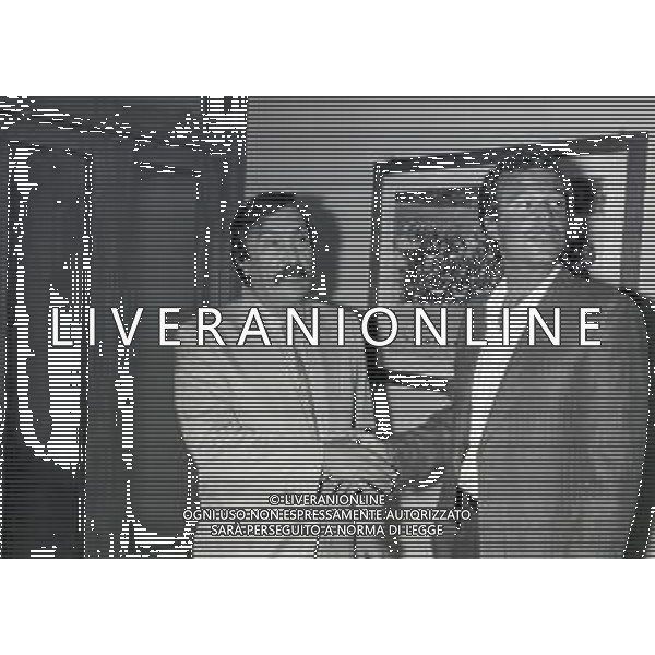 NEG-RETROSPETTIVA LUCIANO SPINOSI CALCIATORE NELLA FOTO LUCIANO SPINOSI CON SILVANO RAMACCIONI NELLA SEDE DEL MILAN NELL\'ANNO 1983-1984 AG ALDO LIVERANI SAS  