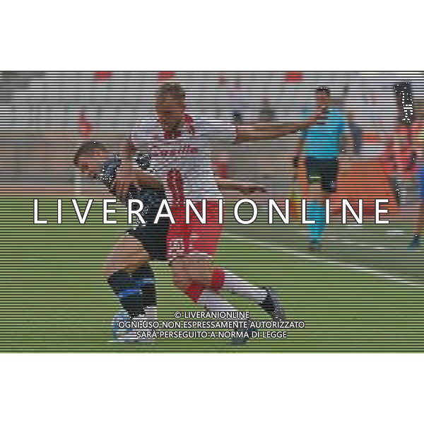 Giuseppe Sibilli (SSC Bari) and Oliver Nielsen during the Italian Serie B match SSC Bari vs Como 1907 on October 01,, 2023 at the San Nicola stadium in Bari, Italy. Photo by Emmanuele Mastrodonato/ag. Aldo Liverani sas