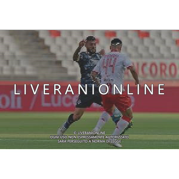 Patrick Cutrone (Como 1907) and Gennaro Acampora (SSC Bari) during the Italian Serie B match SSC Bari vs Como 1907 on October 01,, 2023 at the San Nicola stadium in Bari, Italy. Photo by Emmanuele Mastrodonato/ag. Aldo Liverani sas