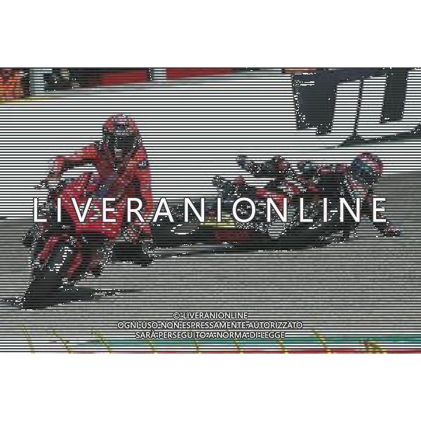 IMOLA 07 10 2023 AUTODROMO ENZO E DINO FERRARI CAMPIONATO ITALIANO VELOCITA\' GARA 1 SUPERBIKE VINCITORE LORENZO ZANETTI NELLA FOTO LORENZO ZANETTI E LA CADUTA DI MICHELE PIRRO ALLA VARIANTE BASSA ©SANNA / AGENZIA ALDO LIVERANI SAS