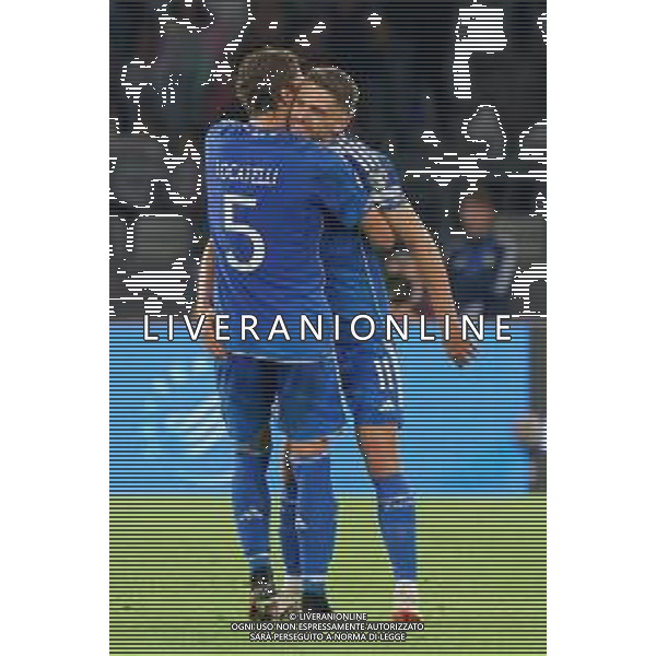 Domenico Berardi of Italy celebrates after scoring a goal with Manuel Locatelli of Italy during the UEFA EURO 2024 European qualifier match between Italy and Malta at Stadio San Nicola on October 14, 2023 in Bari, Italy. Photo by Emmanuele Mastrodonato/ag. Aldo Liverani sas/AGENZIA ALDO LIVERANI SAS