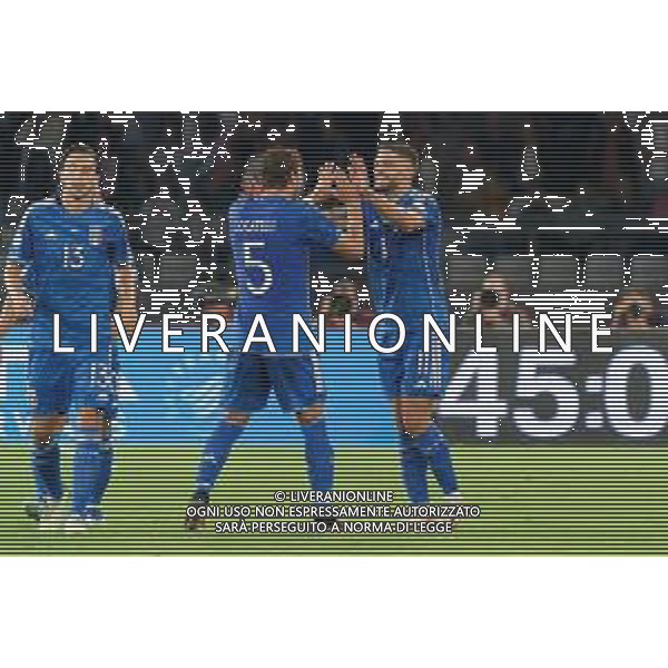Domenico Berardi of Italy celebrates after scoring a goal with Manuel Locatelli of Italy during the UEFA EURO 2024 European qualifier match between Italy and Malta at Stadio San Nicola on October 14, 2023 in Bari, Italy. Photo by Emmanuele Mastrodonato/ag. Aldo Liverani sas