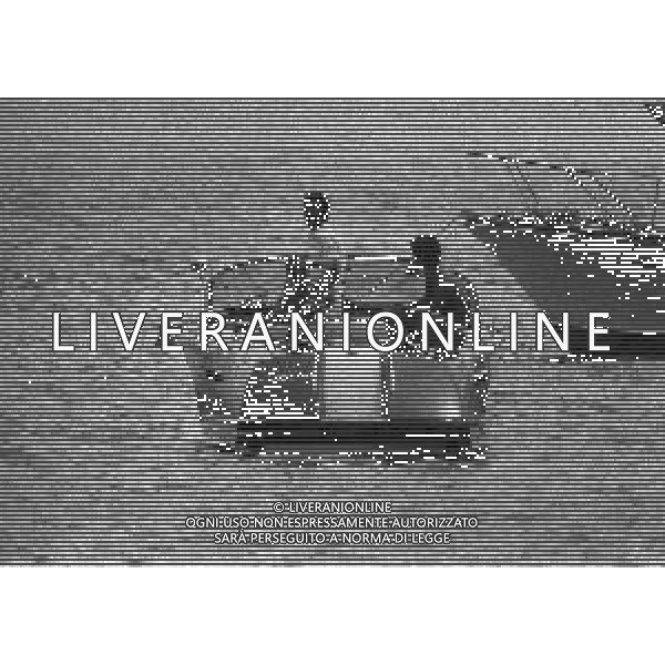 NEG-RETROSPETTIVA GIANNI RIVERA CALCIATORE NELLA FOTO GIANNI RIVERA IN SARDEGNA CON IL FINANZIERE FRANCO AMBROSIO NELL\'ANNO 1975 AG ALDO LIVERANI SAS 