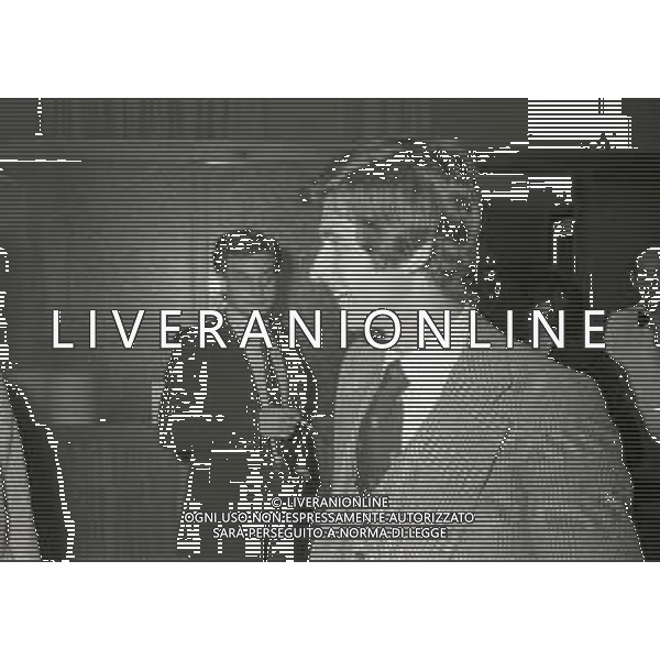 NEG-RETROSPETTIVA GIANNI RIVERA CALCIATORE NELLA FOTO GIANNI RIVERA A MILANO NELL\'ANNO 1975 AL SALONE ACHILLI MOTORS CONCESSIONARIO ROLLS ROYCE CON FRANCO AMBROSIO E RICCARDO MINIGGIO AG ALDO LIVERANI SAS 