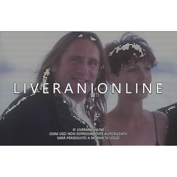 DIAP-RETROSPETTIVA GERARD DEPARDIEU ATTORE NELLA FOTO GERARD DEPARDIEU CON JAMIE LEE CURTIS NELL\'ANNO 1992 A CANNES  AG ALDO LIVERANI SAS 