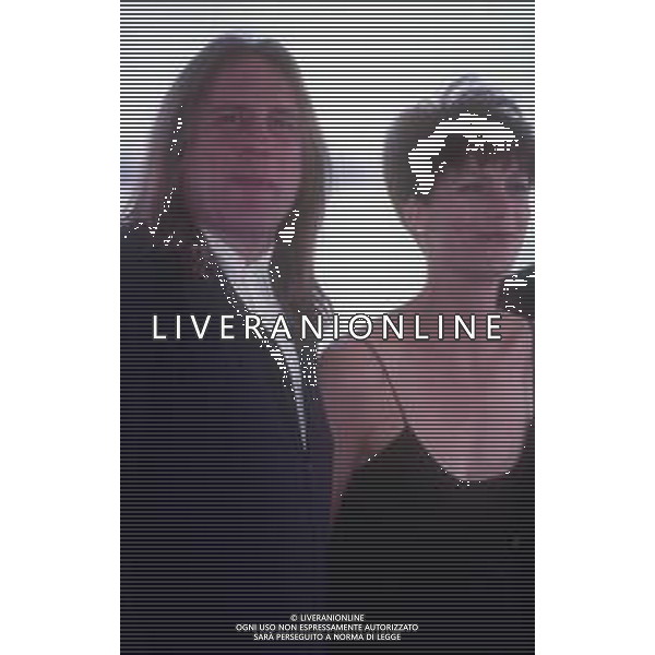 DIAP-RETROSPETTIVA GERARD DEPARDIEU ATTORE NELLA FOTO GERARD DEPARDIEU CON JAMIE LEE CURTIS NELL\'ANNO 1992 A CANNES  AG ALDO LIVERANI SAS 