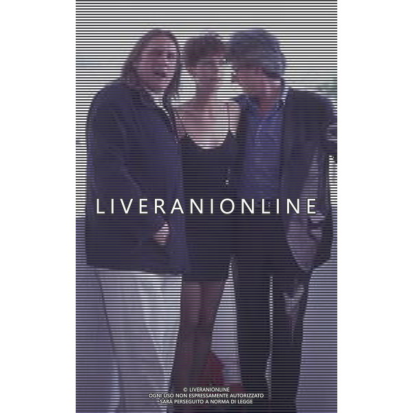 DIAP-RETROSPETTIVA GERARD DEPARDIEU ATTORE NELLA FOTO GERARD DEPARDIEU CON JAMIE LEE CURTIS NELL\'ANNO 1992 A CANNES  AG ALDO LIVERANI SAS 