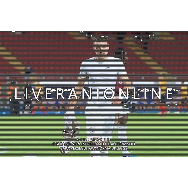 Alessandro Buongiorno of Torino FC takes off his shirt to give it to the fans during the Italian soccer Serie A match US Lecce vs Torino FC on October 28, 2023 at Via del Mare Stadium in Lecce, Italy. Photo by Emmanuele Mastrodonato/ag. Aldo Liverani sas