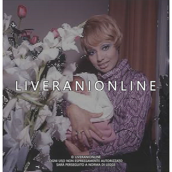 COL-RETROSPETTIVA LARA SAINT PAUL CANTANTE NELLA FOTO LARA SAINT PAUL CON LA FAMIGLIA AG ALDO LIVERANI SAS