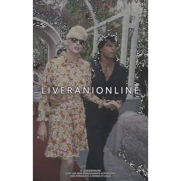 DIAP-RETROSPETTIVA BRIGITTE NIELSEN ATTRICE NELLA FOTO BRIGITTE NIELSEN CON MARK GASTINEAU NELL\'ANNO 1985 A TAORMINA AG ALDO LIVERANI SAS