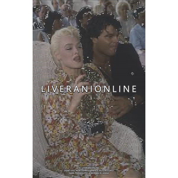 DIAP-RETROSPETTIVA BRIGITTE NIELSEN ATTRICE NELLA FOTO BRIGITTE NIELSEN CON MARK GASTINEAU NELL\'ANNO 1985 A TAORMINA AG ALDO LIVERANI SAS 