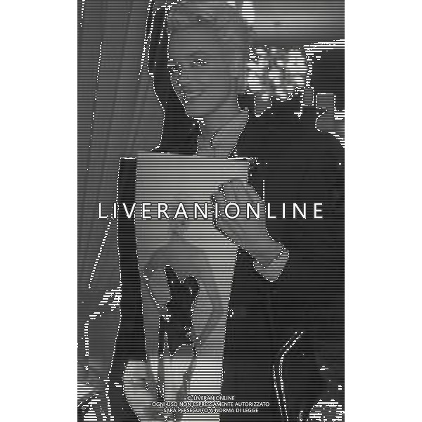 NEG-RETROSPETTIVA BRIGITTE NIELSEN ATTRICE  NELLA FOTO BRIGITTE NIELSEN PRESENTA IL SUO DISCO NELL\'ANNO 1987 A MILANO IN TERRAZZA MARTINI  AG ALDO LIVERANI SAS