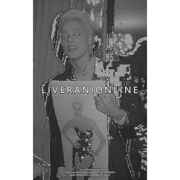 NEG-RETROSPETTIVA BRIGITTE NIELSEN ATTRICE  NELLA FOTO BRIGITTE NIELSEN PRESENTA IL SUO DISCO NELL\'ANNO 1987 A MILANO IN TERRAZZA MARTINI  AG ALDO LIVERANI SAS