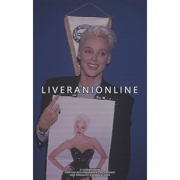 COL-RETROSPETTIVA BRIGITTE NIELSEN ATTRICE NELLA FOTO BRIGITTE NIELSEN PRESENTA IL SUO DISCO NELL\'ANNO 1987 A MILANO IN TERRAZZA MARTINI AG ALDO LIVERANI SAS 