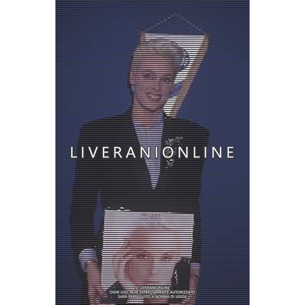 COL-RETROSPETTIVA BRIGITTE NIELSEN ATTRICE NELLA FOTO BRIGITTE NIELSEN PRESENTA IL SUO DISCO NELL\'ANNO 1987 A MILANO IN TERRAZZA MARTINI AG ALDO LIVERANI SAS 