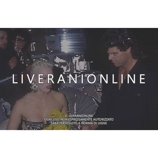 DIAP-RETROSPETTIVA BRIGITTE NIELSEN ATTRICE  NELLA FOTO BRIGITTE NIELSEN CON MARK GASTINEAU NELL\'ANNO 1988 A MILANO AG ALDO LIVERANI SAS
