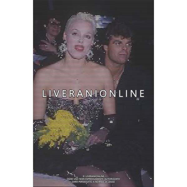 DIAP-RETROSPETTIVA BRIGITTE NIELSEN ATTRICE  NELLA FOTO BRIGITTE NIELSEN CON MARK GASTINEAU NELL\'ANNO 1988 A MILANO AG ALDO LIVERANI SAS