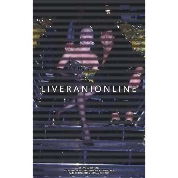 DIAP-RETROSPETTIVA BRIGITTE NIELSEN ATTRICE  NELLA FOTO BRIGITTE NIELSEN CON MARK GASTINEAU NELL\'ANNO 1988 A MILANO AG ALDO LIVERANI SAS