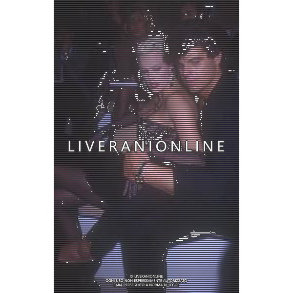 DIAP-RETROSPETTIVA BRIGITTE NIELSEN ATTRICE  NELLA FOTO BRIGITTE NIELSEN CON MARK GASTINEAU NELL\'ANNO 1988 A MILANO AG ALDO LIVERANI SAS