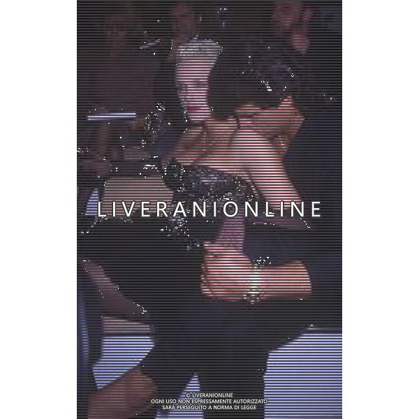 DIAP-RETROSPETTIVA BRIGITTE NIELSEN ATTRICE  NELLA FOTO BRIGITTE NIELSEN CON MARK GASTINEAU NELL\'ANNO 1988 A MILANO AG ALDO LIVERANI SAS
