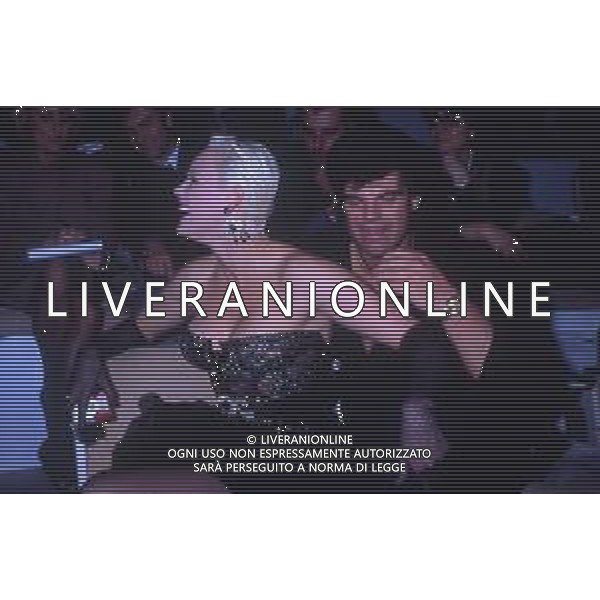 DIAP-RETROSPETTIVA BRIGITTE NIELSEN ATTRICE  NELLA FOTO BRIGITTE NIELSEN CON MARK GASTINEAU NELL\'ANNO 1988 A MILANO AG ALDO LIVERANI SAS