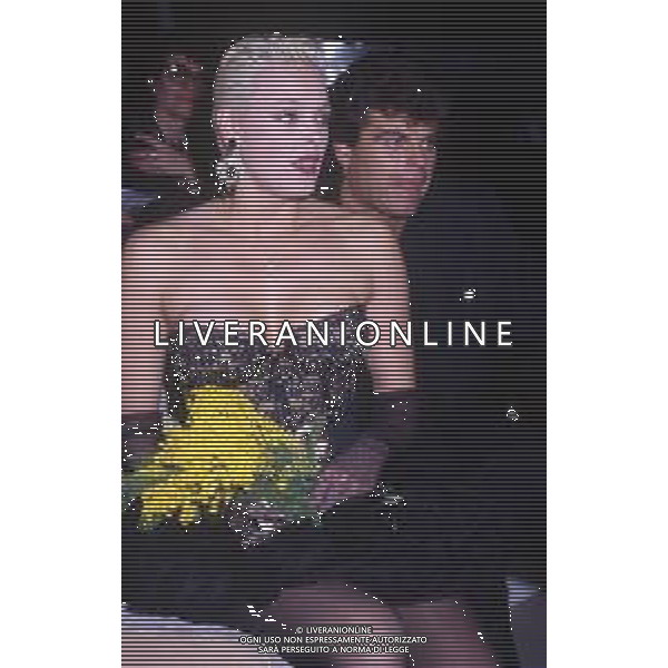 DIAP-RETROSPETTIVA BRIGITTE NIELSEN ATTRICE  NELLA FOTO BRIGITTE NIELSEN CON MARK GASTINEAU NELL\'ANNO 1988 A MILANO AG ALDO LIVERANI SAS
