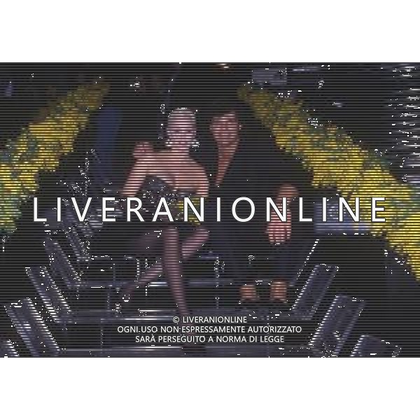 DIAP-RETROSPETTIVA BRIGITTE NIELSEN ATTRICE  NELLA FOTO BRIGITTE NIELSEN CON MARK GASTINEAU NELL\'ANNO 1988 A MILANO AG ALDO LIVERANI SAS