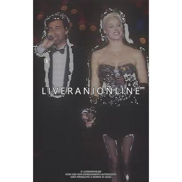DIAP-RETROSPETTIVA BRIGITTE NIELSEN ATTRICE NELLA FOTO BRIGITTE NIELSEN NELL\'ANNO 1988 A MILANO DIAP-RETROSPETTIVA BRIGITTE NIELSEN ATTRICE  NELLA FOTO BRIGITTE NIELSEN CON LUCA BARBARESCHI NELL\'ANNO 1988 A MILANO AG ALDO LIVERANI SAS 