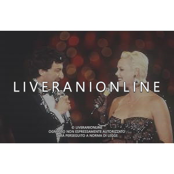 DIAP-RETROSPETTIVA BRIGITTE NIELSEN ATTRICE NELLA FOTO BRIGITTE NIELSEN NELL\'ANNO 1988 A MILANO OSPITE DELLA TRASMISSIONE TELEVISIVA “ ODIENS“ CON LUCA BARBARESCHI AG ALDO LIVERANI SAS