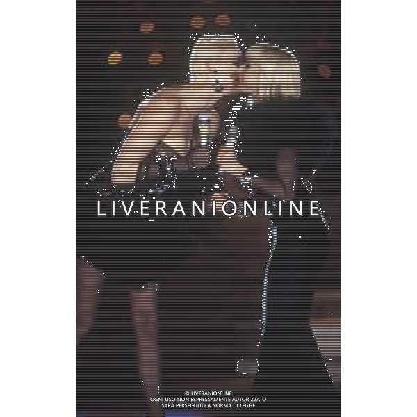 DIAP-RETROSPETTIVA BRIGITTE NIELSEN ATTRICE  NELLA FOTO BRIGITTE NIELSEN NELL\'ANNO 1988 A MILANO CON RAFFAELLA CARRA\' AG ALDO LIVERANI SAS