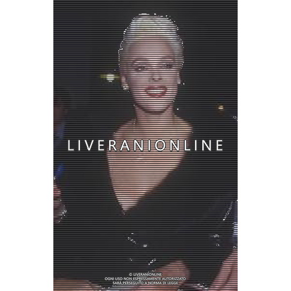 DIAP-RETROSPETTIVA BRIGITTE NIELSEN ATTRICE NELLA FOTO BRIGITTE NIELSEN NELL\'ANNO 1989 A MILANO TRASMISSIONE TELEVISIVA “ODIENS“ AG ALDO LIVERANI SAS 