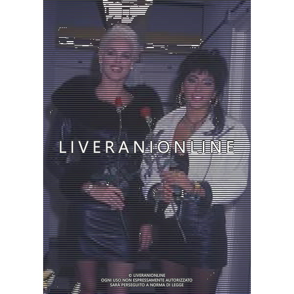 DIAP-RETROSPETTIVA BRIGITTE NIELSEN ATTRICE NELLA FOTO BRIGITTE NIELSEN CON SABRINA SALERNO NELL\'ANNO 1989 A MILANO TRASMISSIONE TELEVISIVA “ODIENS“ AG ALDO LIVERANI SAS 
