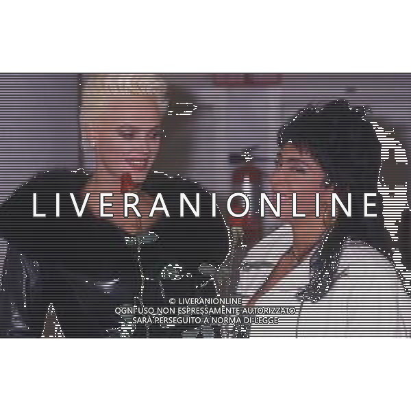 DIAP-RETROSPETTIVA BRIGITTE NIELSEN ATTRICE NELLA FOTO BRIGITTE NIELSEN CON SABRINA SALERNO NELL\'ANNO 1989 A MILANO TRASMISSIONE TELEVISIVA “ODIENS“ AG ALDO LIVERANI SAS 