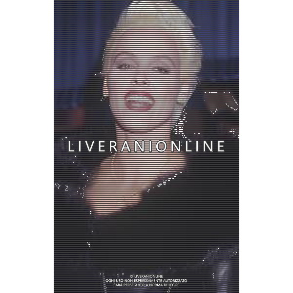 DIAP-RETROSPETTIVA BRIGITTE NIELSEN ATTRICE NELLA FOTO BRIGITTE NIELSEN NELL\'ANNO 1989 A MILANO TRASMISSIONE TELEVISIVA “ODIENS“ AG ALDO LIVERANI SAS 