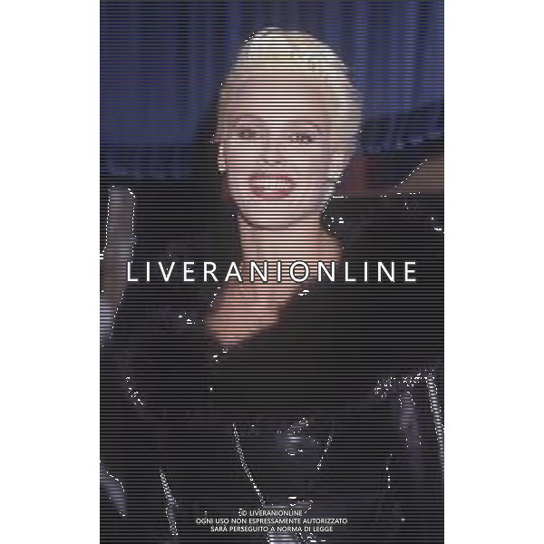 DIAP-RETROSPETTIVA BRIGITTE NIELSEN ATTRICE NELLA FOTO BRIGITTE NIELSEN NELL\'ANNO 1989 A MILANO TRASMISSIONE TELEVISIVA “ODIENS“ AG ALDO LIVERANI SAS 