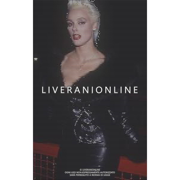 DIAP-RETROSPETTIVA BRIGITTE NIELSEN ATTRICE NELLA FOTO BRIGITTE NIELSEN NELL\'ANNO 1989 A MILANO TRASMISSIONE TELEVISIVA “ODIENS“ AG ALDO LIVERANI SAS 